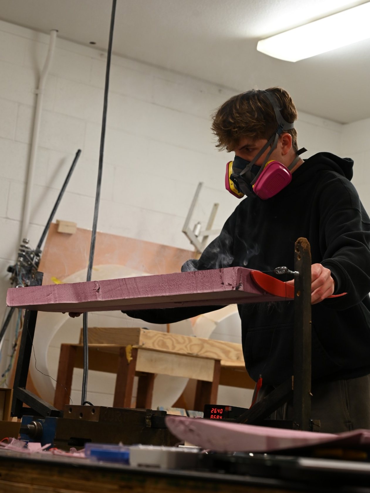 Hot-wire cutting a foam core to an airfoil profile